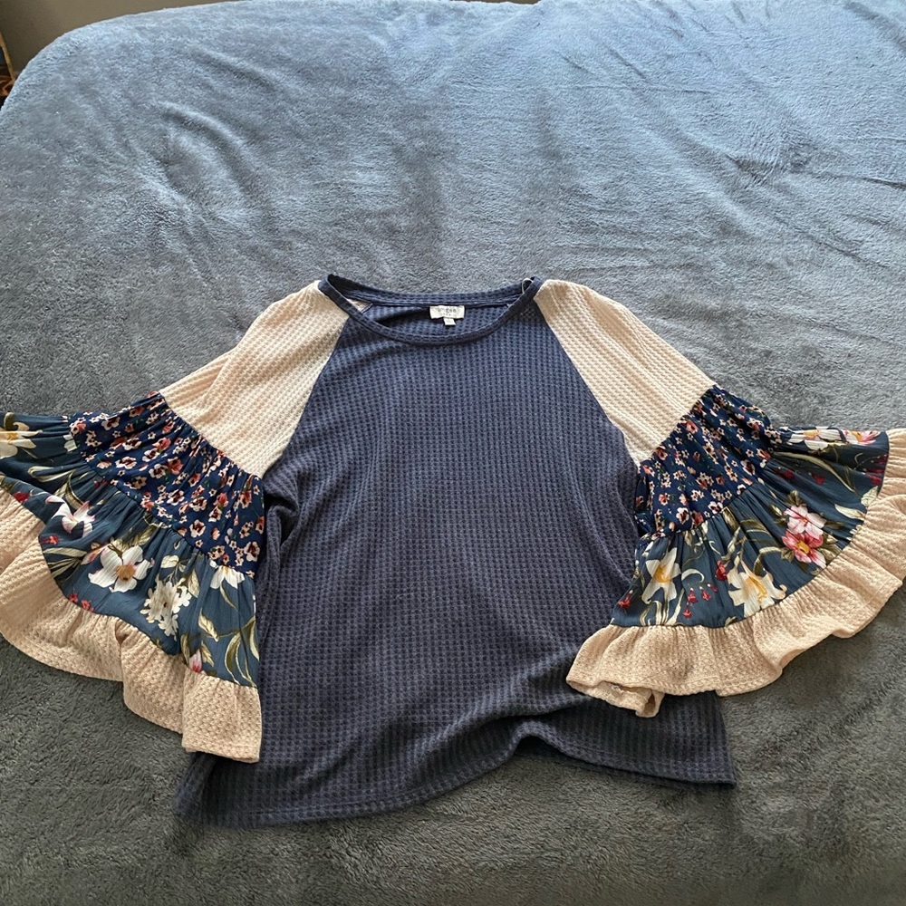 Adorable waffle knit long sleeve tee.